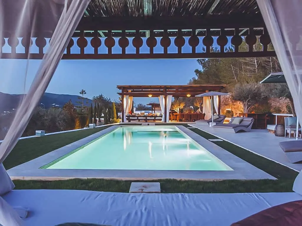 Villa Rental Ibiza - 4 Bedrooms - Balearic Bliss - Can Alivia - pool at night and chillout