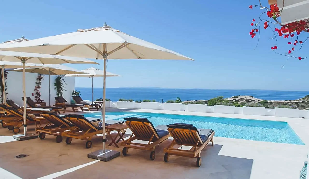 Villa Rental Ibiza - 6 Bedrooms - Balearic bliss - Villa Alison - loungers next to pool with sea views